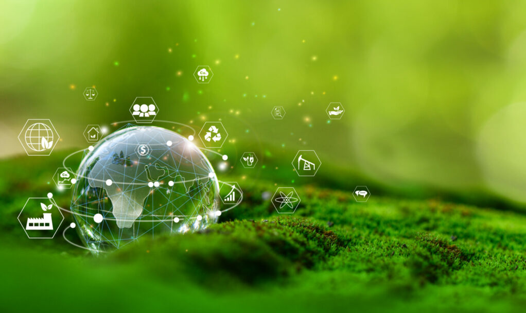 Glass globe in green forest with the icon environment of ESG, co2, circular company, and net zero. Technology Environment, Organization Sustainable development environmental.