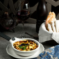 fried julien with mushrooms and cheese