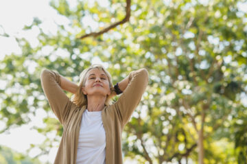 Portrait photo of happy senior Caucasian woman relaxing and brea
